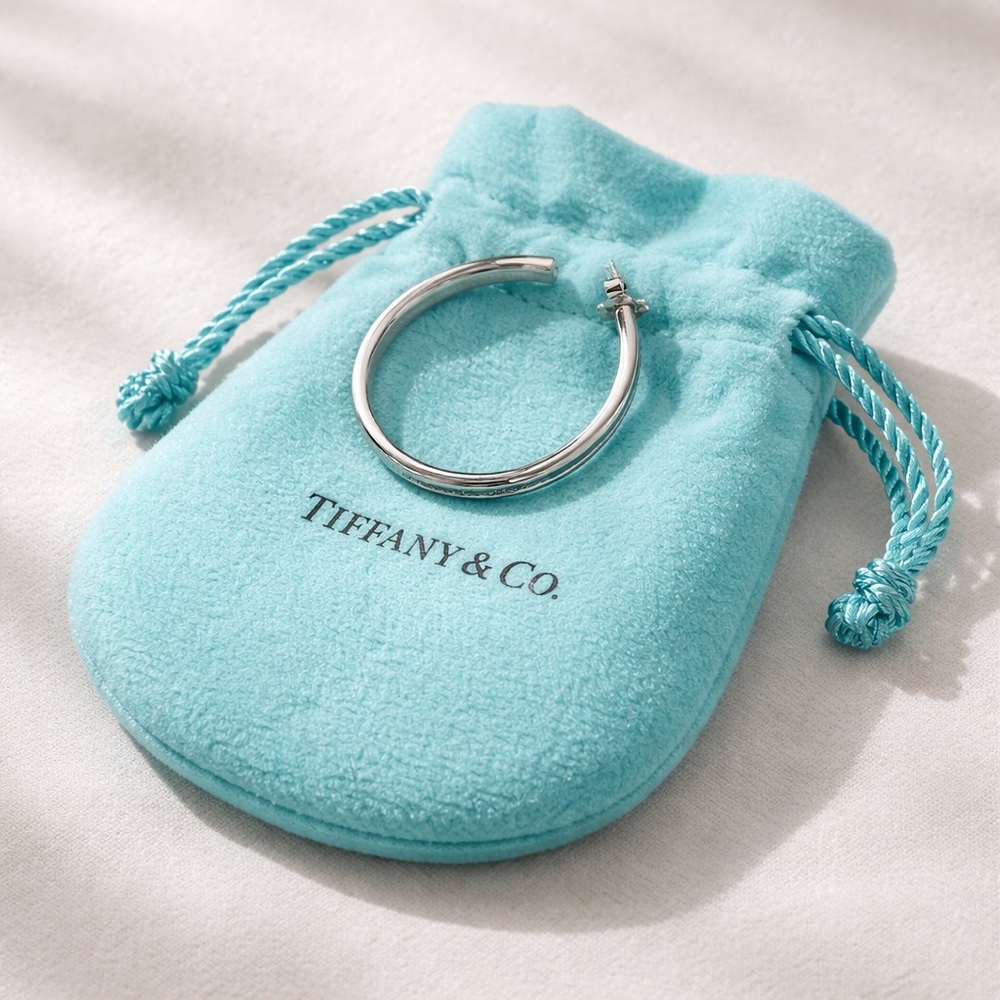 Single Large Tiffany & Co. Silver Hoop Earring